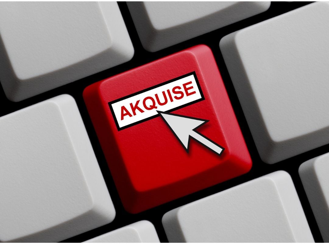 Was müssen Sie bei der Kundenakquise für Ihre Immobilienverwaltung beachten? Taste auf Tastatur mit dem Wort "Akquise"